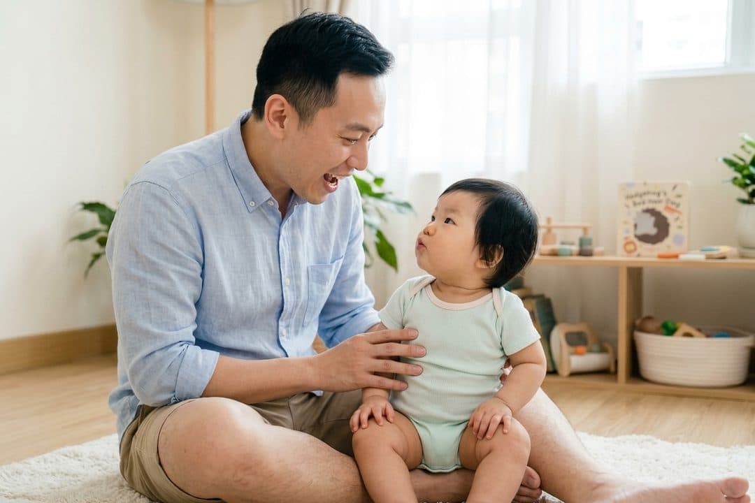 A parent and baby sharing a playful interaction