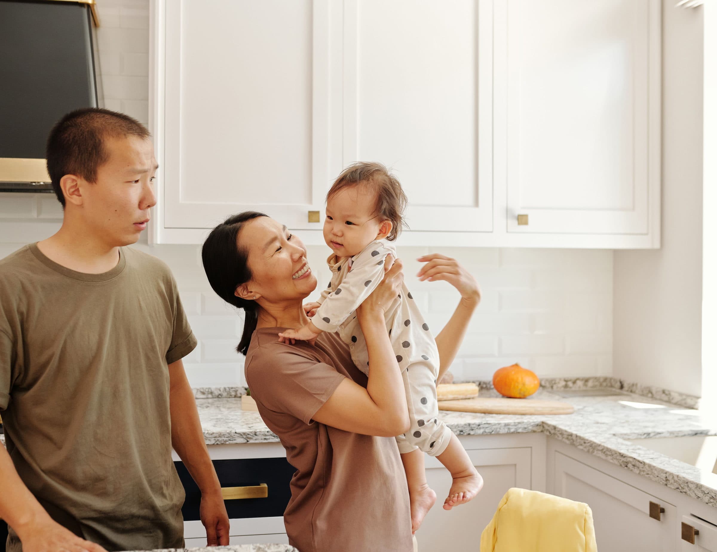 A family talking about a child's development with a doctor